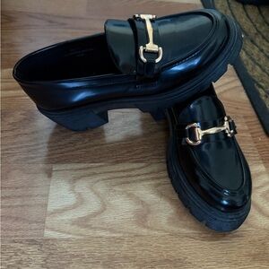 Elegant Black Loafers with Gold Accent